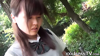 Asian Teen Schoolgirl Teases With Her Fingers Through Her Panties